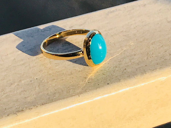 Ring with turquoise stone.   ( Fairouz )