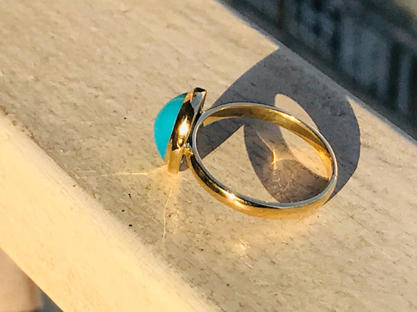 Ring with turquoise stone.   ( Fairouz )