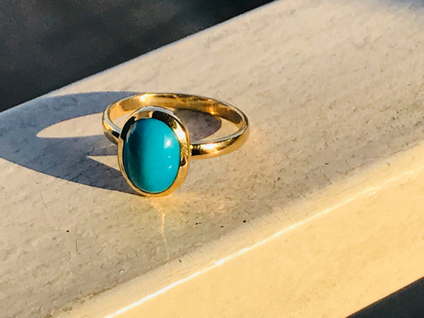 Ring with turquoise stone.   ( Fairouz )