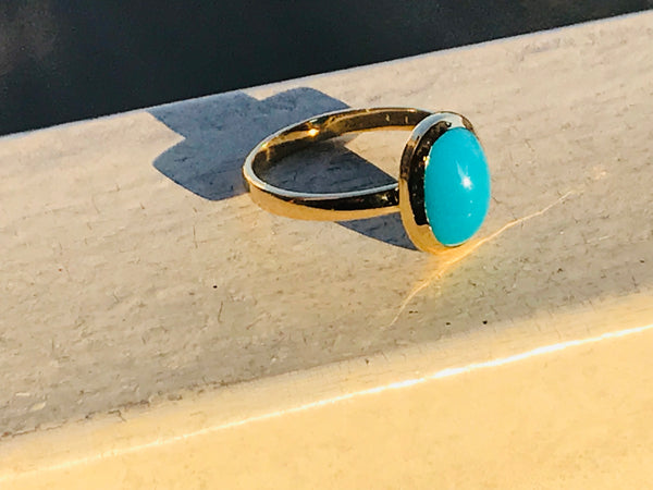 Ring with turquoise stone.   ( Fairouz )