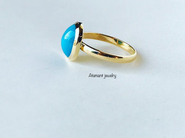 Ring with turquoise stone.   ( Fairouz )