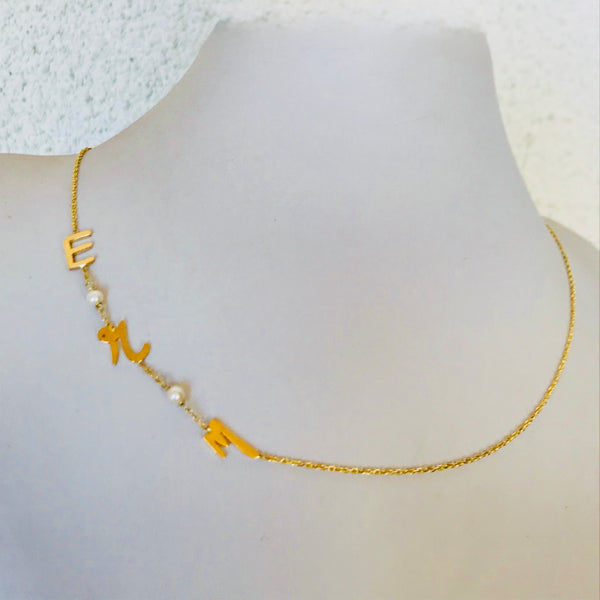 Initials with small pearls