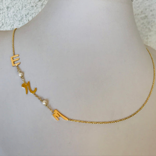 Initials with small pearls
