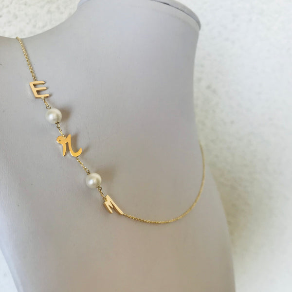 Initials with pearls