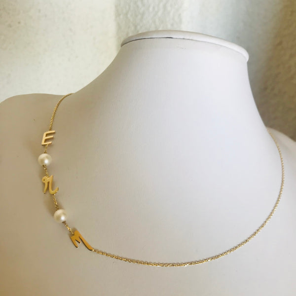 Initials with pearls