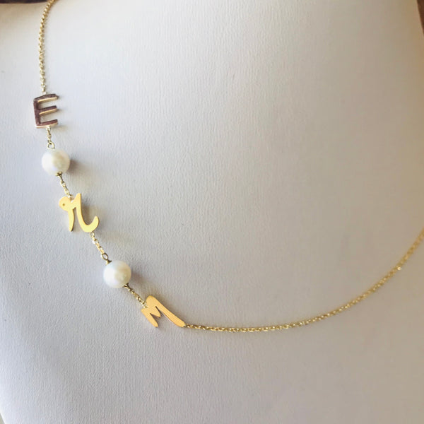 Initials with pearls