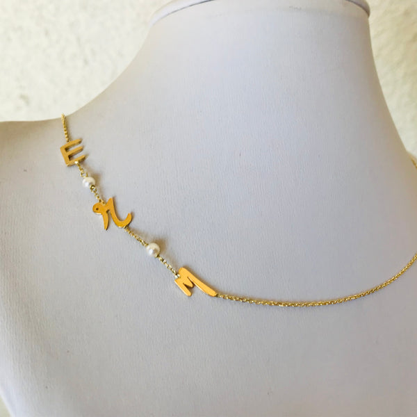 Initials with small pearls