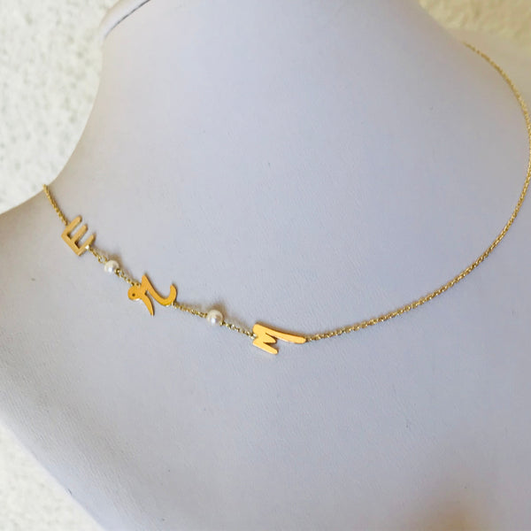 Initials with small pearls