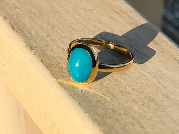Ring with turquoise stone.   ( Fairouz )