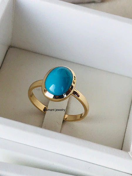 Ring with turquoise stone.   ( Fairouz )
