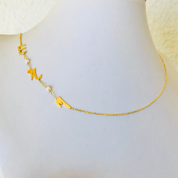 Initials with small pearls