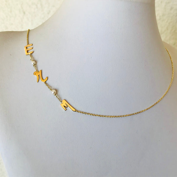 Initials with small pearls