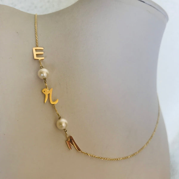 Initials with pearls